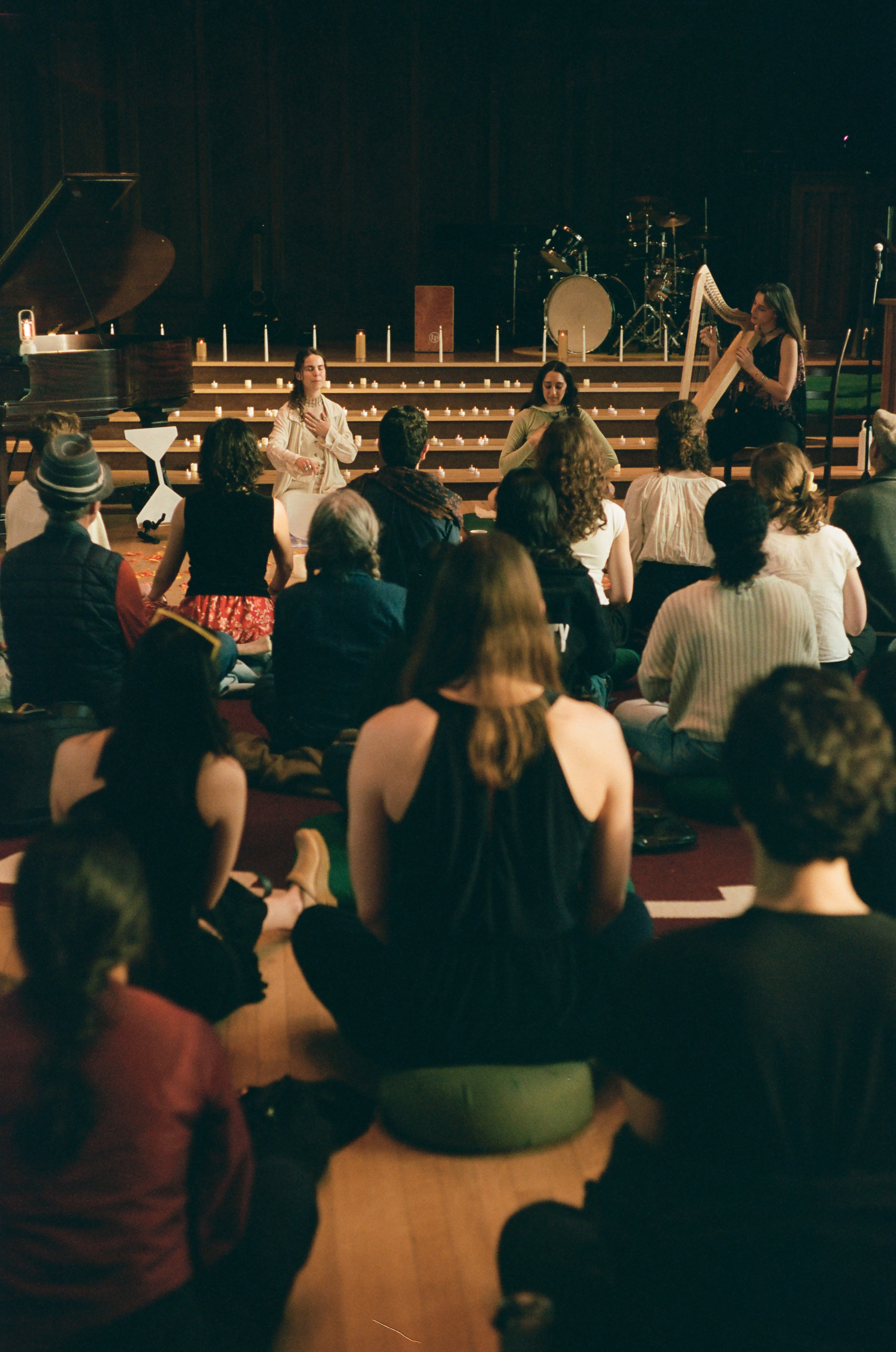 Candlelit gathering in a chapel